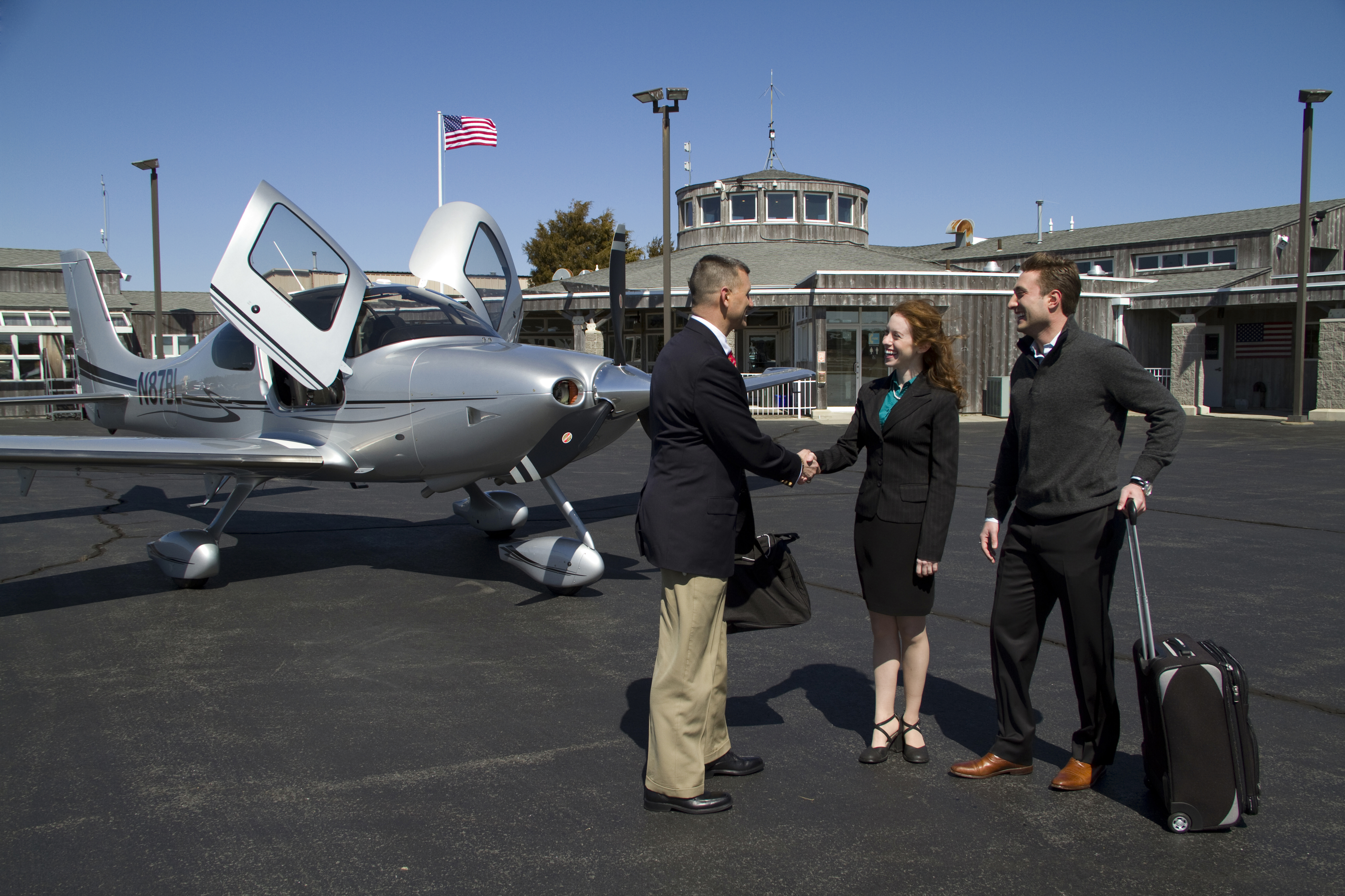 Cirrus pilot greeting passengers